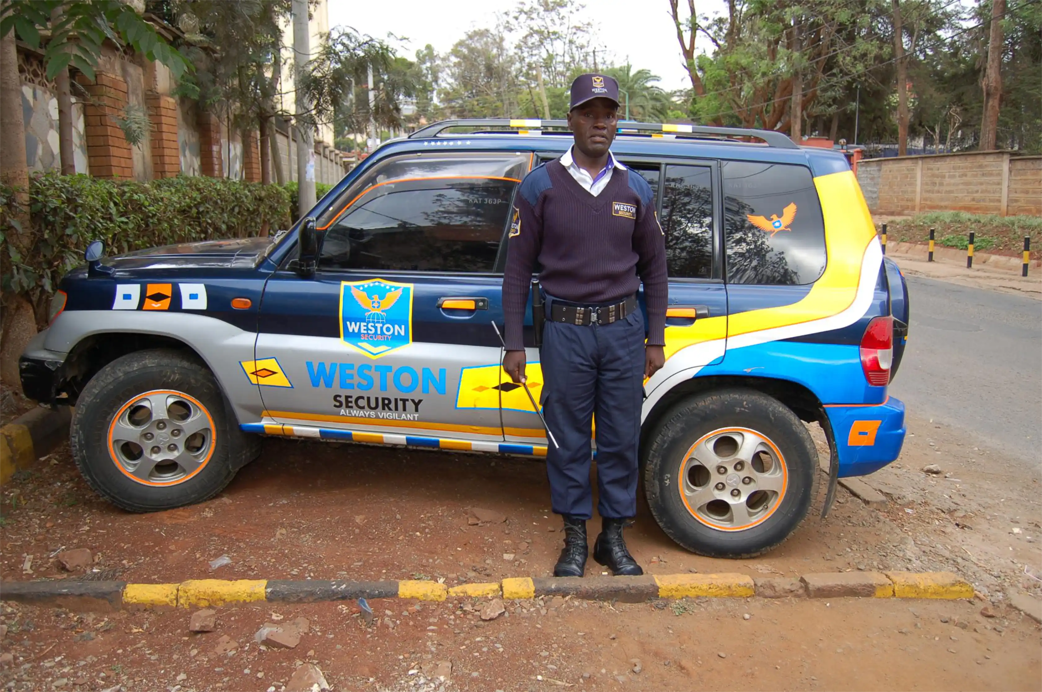 Weston Security response officer beside a mobile patrol vehicle in Kenya